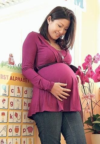 女星大肚照比美:梁静茹俏皮 李嘉欣美艳(图)