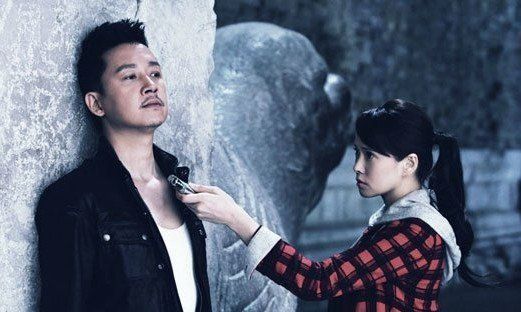 潘粤明与伊能静(资料图)。