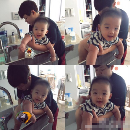 范玮琪与阿雅抱对方孩子合影 