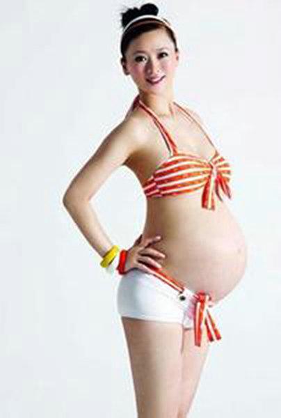 女星大尺度斗艳孕照 官恩娜挺巨肚出海划艇 女星大尺度斗艳孕照 官恩娜挺巨肚出海划艇