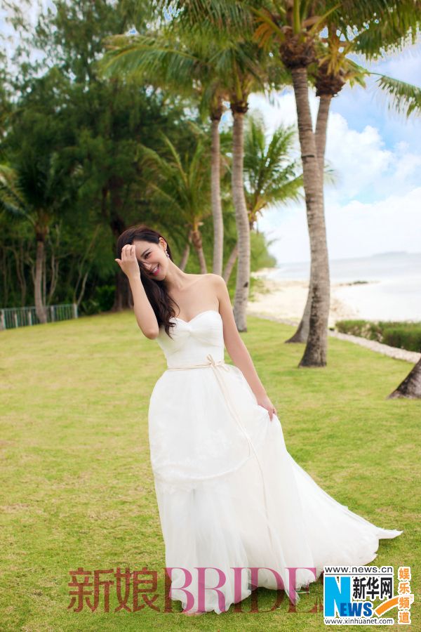 张歆艺浪漫婚纱大片 甜笑唯美尽显新娘娇媚